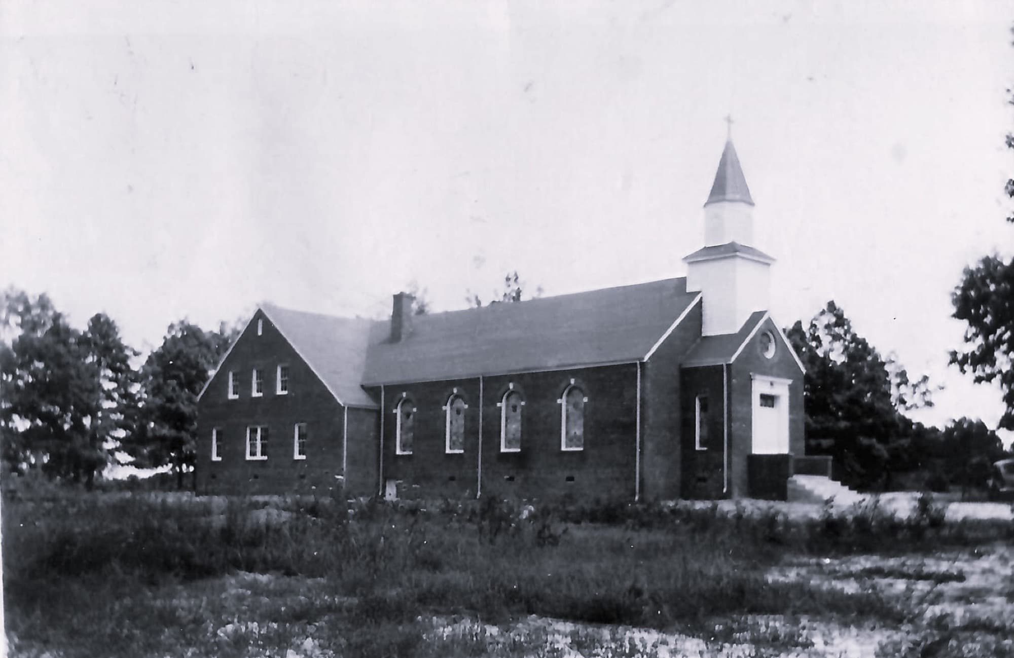 A historic photo of the original Vanderburg church building